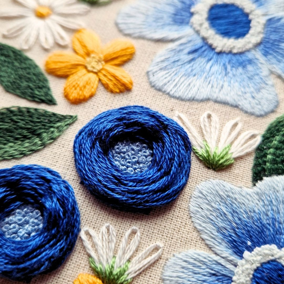 An example of a floral embroidery piece by Blackbird & Bloom.