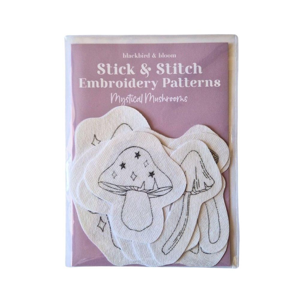 Pack of Stick & Stitch Embroidery Patterns with mushroom designs on a pink background